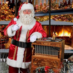 Kerst entertainment: Kerstman met orgel