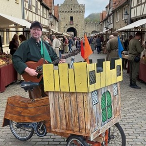 Troubadour met zijn kasteel